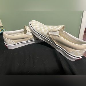 Brand new checkered vans slip on